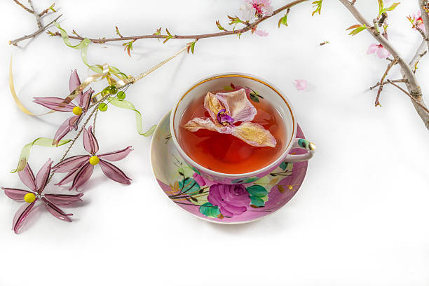 istock Blooming almond tree branch and tea-cup still life 514843742