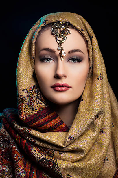 istock Beautiful young woman in shawl 514845380