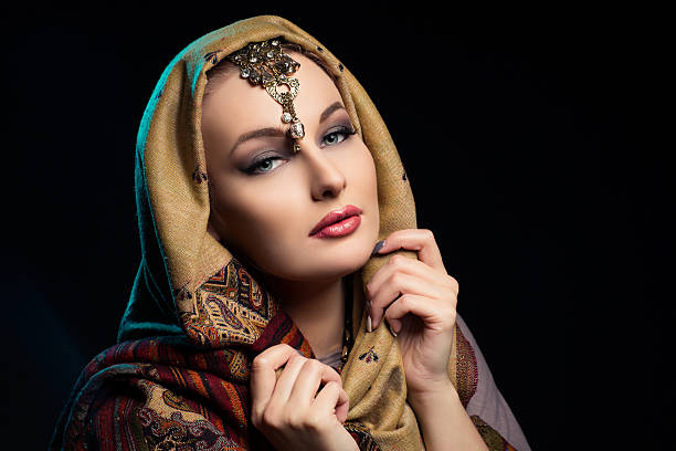 istock Beautiful young woman in shawl 514845588