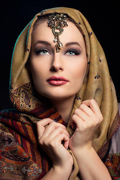 istock Beautiful young woman in shawl 514845790