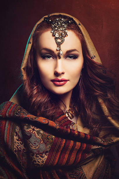 istock Beautiful young woman in shawl 514845994