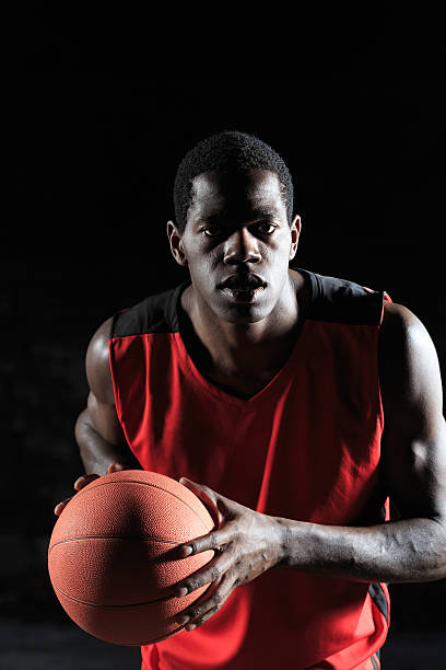 istock Young basketball player with a ball 514847140