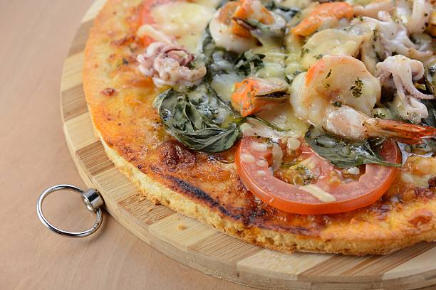 istock Italian traditional pizza with seafood 514850508