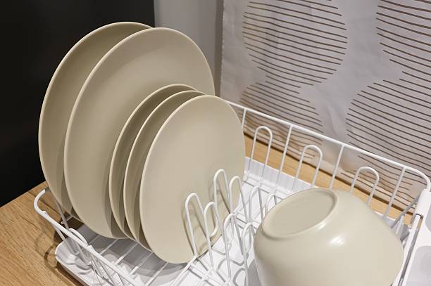 istock Ceramic Dishes and Bowls in Plate Rack 514851584