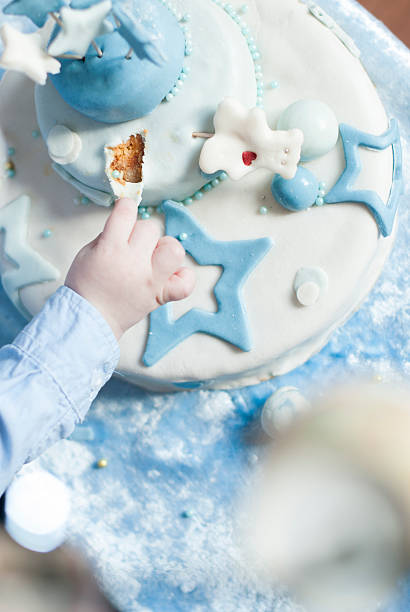 istock birthday cake for baby on table 514852110