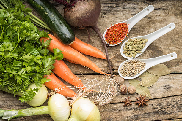 istock Various Spices and Vegetables on wood background. Restaurant menu background 514852569