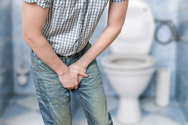Man with prostate problem. Incontinence concept. stock photo