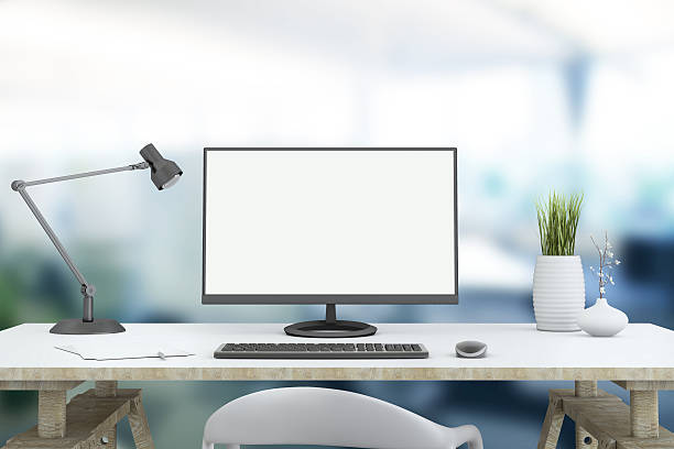 Large PC monitor on a business background