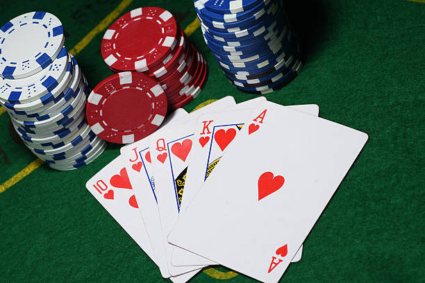 istock Cards and chips for poker on green table, top view 514853436
