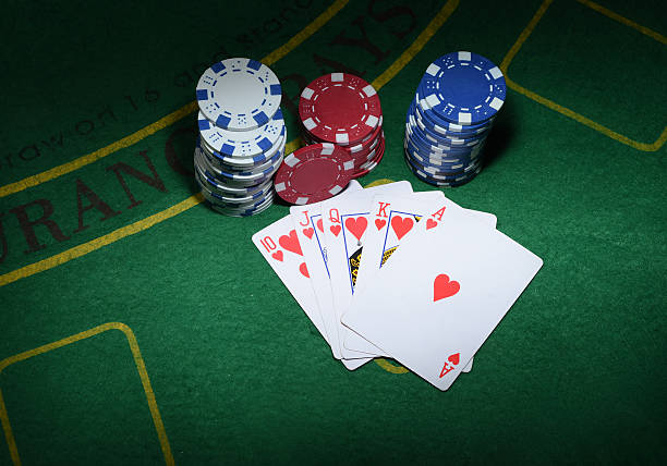 istock Cards and chips for poker on green table, top view 514853550