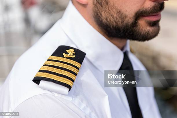 Photo libre de droit de Capitaine De Bateau Avec Des Épaulette banque d'images et plus d'images libres de droit de Capitaine de bateau - Capitaine de bateau, Navire, Capitaine d'équipe