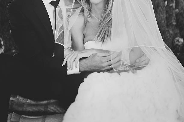 istock Newlywed couple holding hands. 514853743
