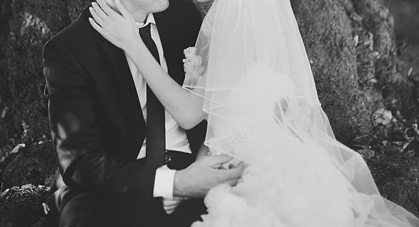 istock Newlywed couple holding hands. 514853747