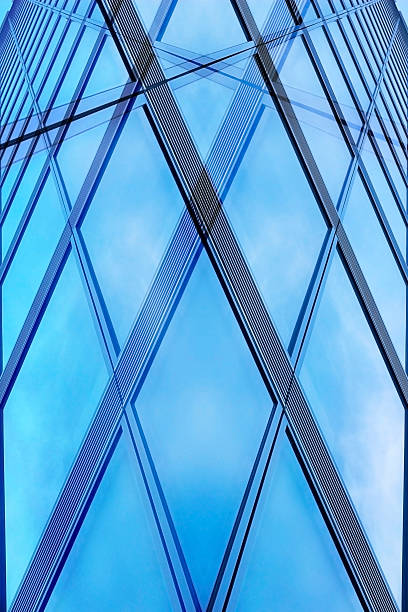 istock Sky reflecting in office building facade. Double exposition photo. 514853896