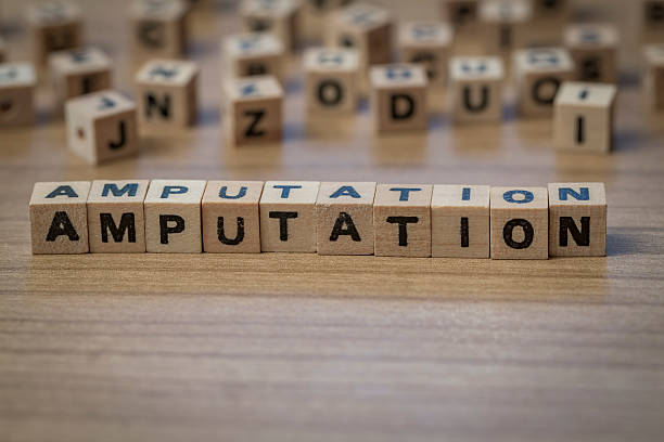 istock Amputation written in wooden cubes 514854316
