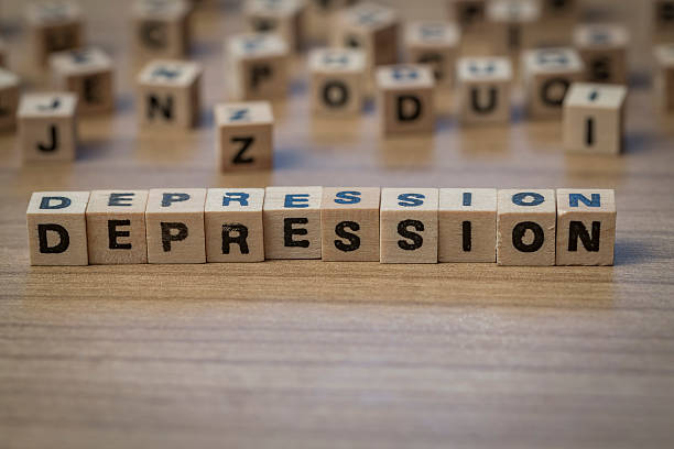 istock Depression written in wooden cubes 514854660