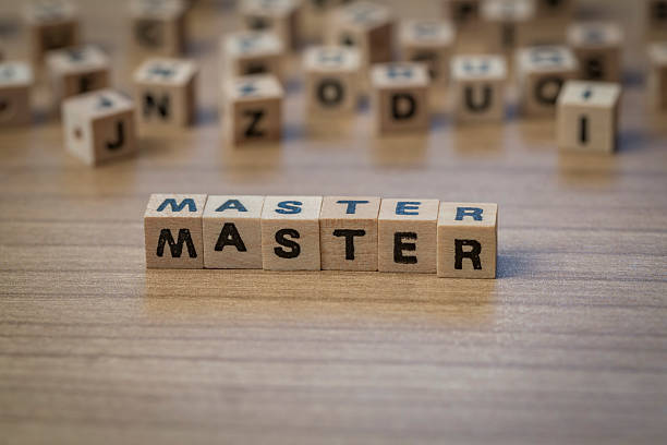 istock Master written in wooden cubes 514855292