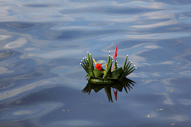 istock Floating basket made from banana leaf in the canal. 514855371