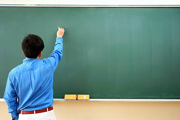 istock School classroom with school desks and blackboard 514855540