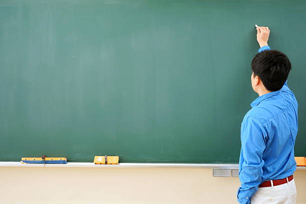 istock School classroom with school desks and blackboard 514855556