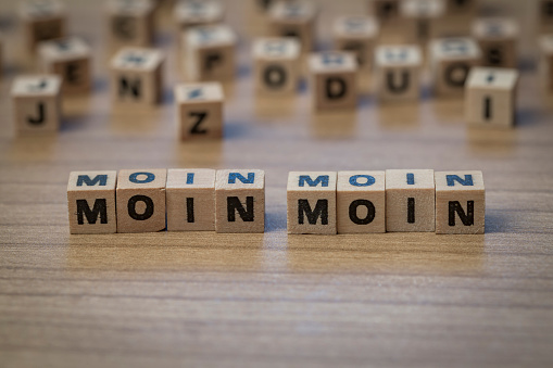 moin moin written in wooden cubes