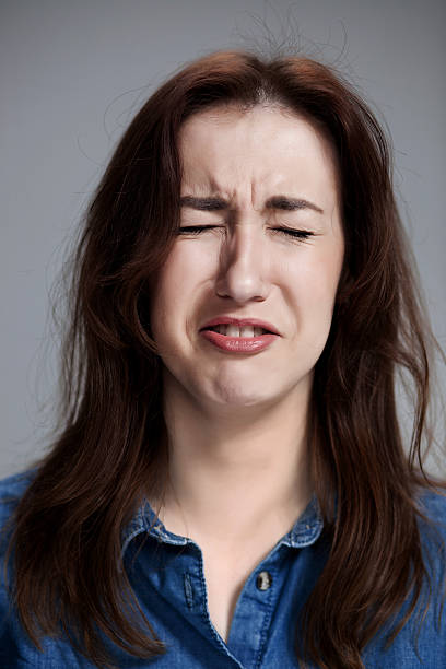 istock The crying woman face closeup 514856394