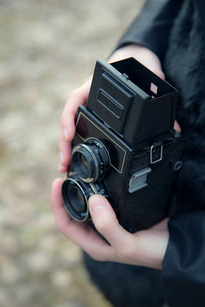 istock girl holding a camera,hipster 514856564