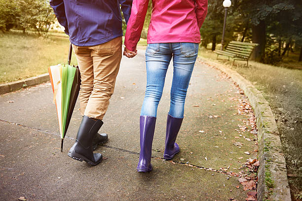 istock Walking in rainy day with special person 514857095