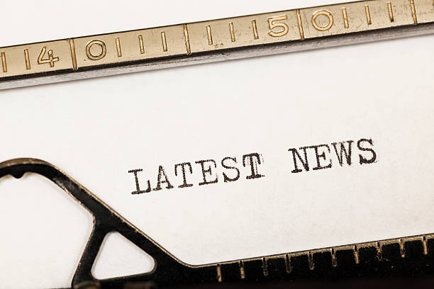 The sentence, Breaking News, written with a typewriter.