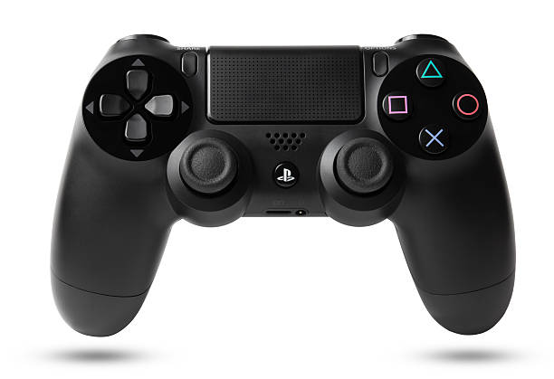 DualShock 4 Wireless Controller for PlayStation 4 Istanbul, Turkei - March 17, 2014: DualShock 4 Wireless Controller for PlayStation 4 gamepad photos stock pictures, royalty-free photos & images