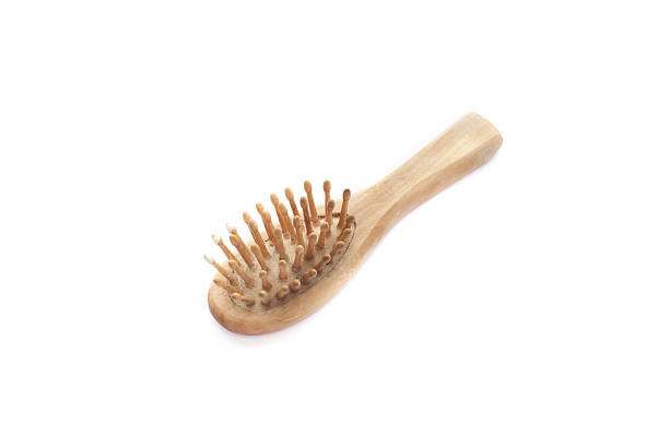 istock Wooden hairbrush isolated on white background 514875759