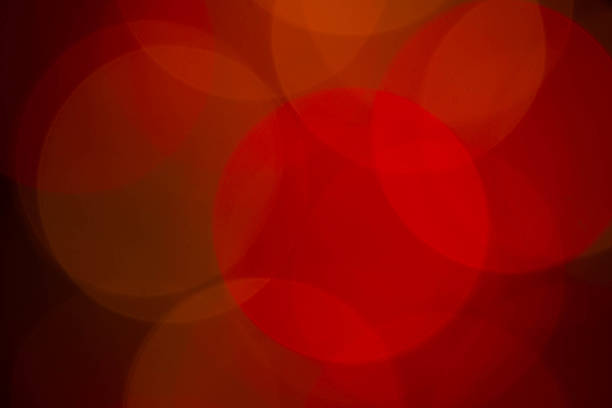 istock High resolution imag of colored blurred dots on dark background. 514875949