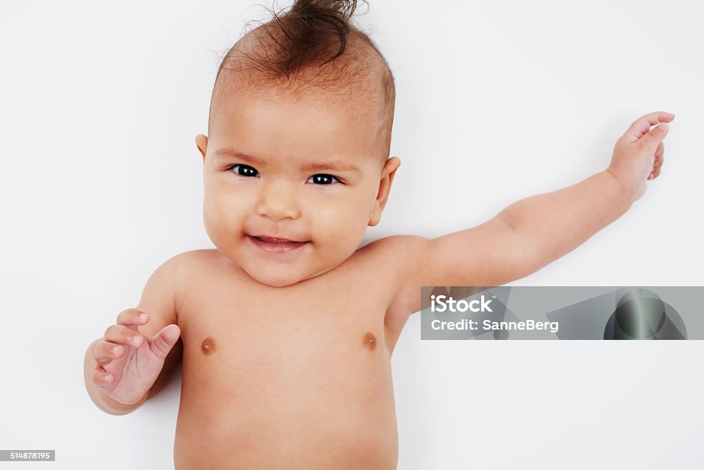 Cheeky Six Month Old Baby Girl With Mohican Hairstyle Stock Photo -  Download Image Now - iStock