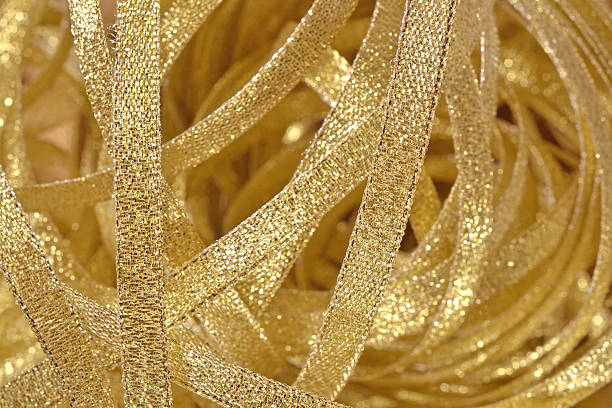 istock Golden ribbons close up 514879051