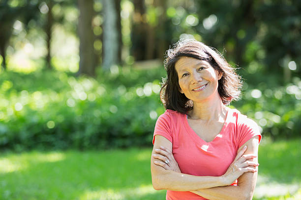 istock Asian woman at the park 514880509
