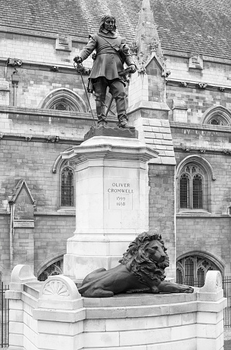 Statue of Oliver Cromwell (1599-1658) outside the Houses of Parliament in London. It was designed by Hamo Thornycroft (1850-1925) and erected in 1899.