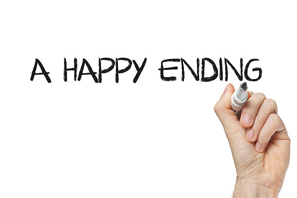 Hand writing a happy ending Hand writing a happy ending on a white board happy end stock pictures, royalty-free photos & images