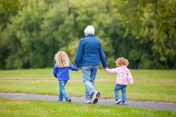 istock Girls & Grandma Walking at Park 514882271
