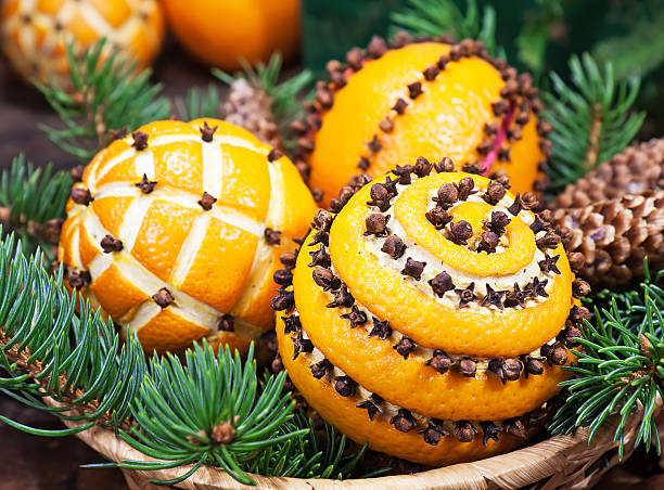 Christmas decoration with oranges in the basket and fir tree