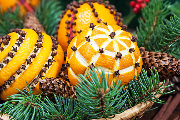 istock Christmas decoration with oranges in the basket and fir tree 514882629