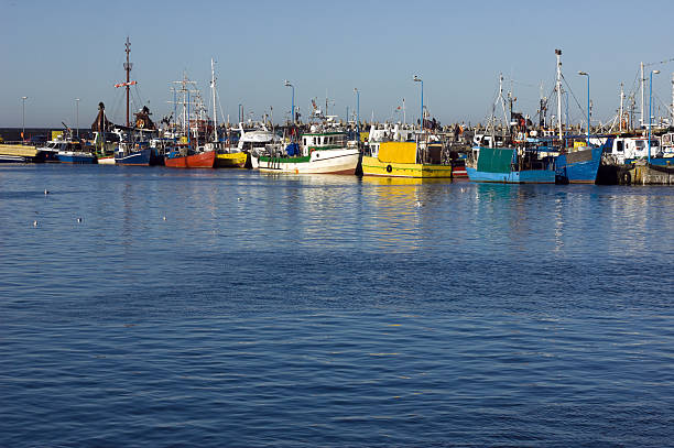 istock Fishing Boats in Harbour 514882727