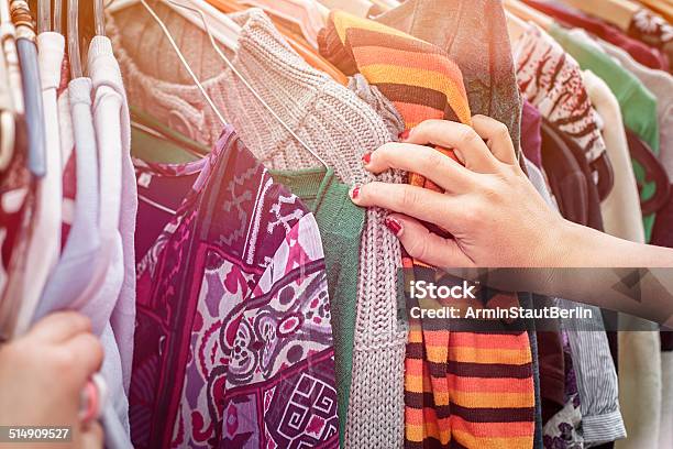 Looking On A Flea Market For Clothes Stock Photo - Download Image Now - Thrift Store, Hand Me Downs, Flea Market