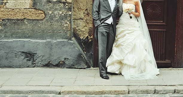 istock Wedding couple walking on the street 514911075