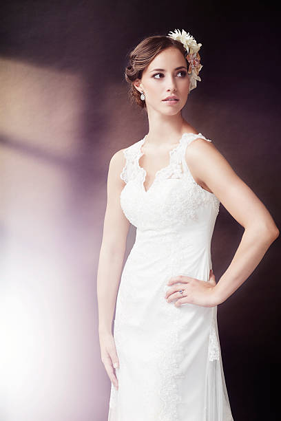 istock Elegant young bride in wedding dress, studio shot 514911103