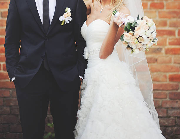 istock Newly wed couple holding hands. 514911929