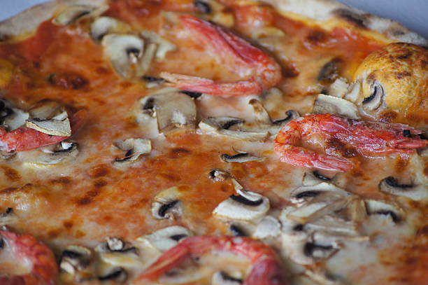 istock Appetizing pizza with mushrooms and shrimp / detail 514913209