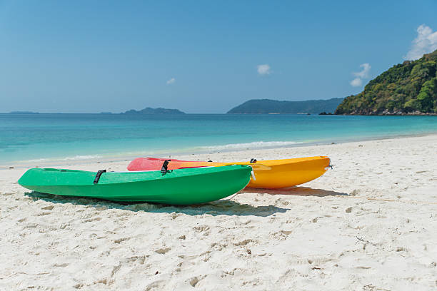 istock Colorful kayaks on the tropical beach, Thailand 514913616