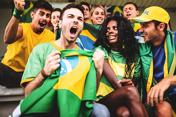 istock Group of brazilian supporters at stadium 514913892