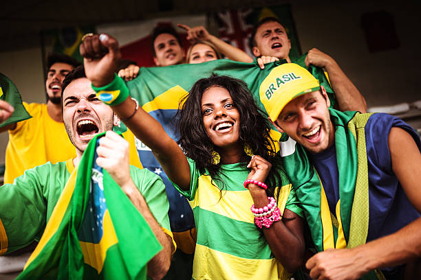 istock Group of brazilian supporters at stadium 514914226