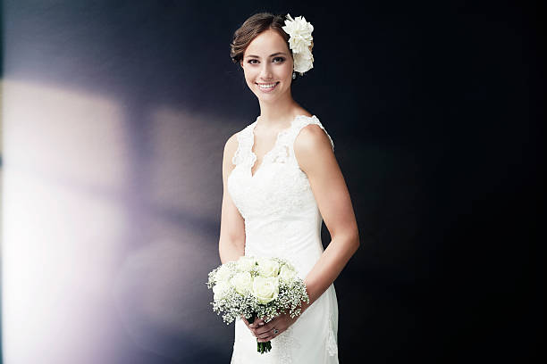 istock Stunning young bride holding bouquet, portrait 514915039